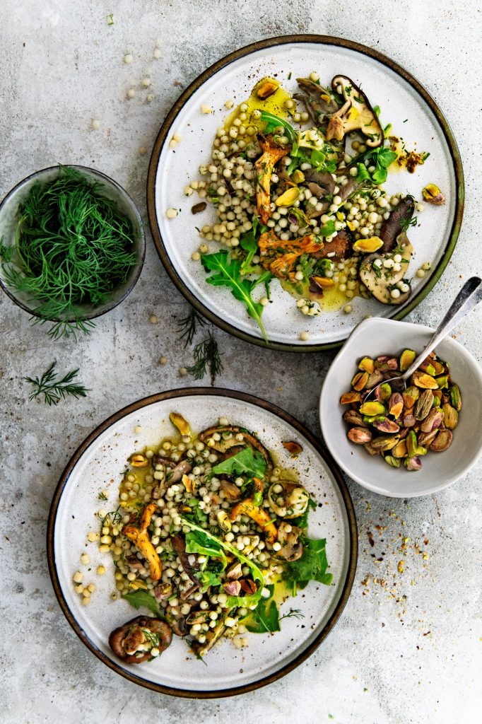 Parelcouscous met paddenstoelen, sinaasappel & pistache