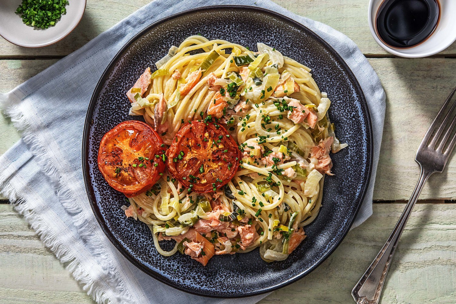Spaghetti met warm gerookte zalm en prei-roomsaus