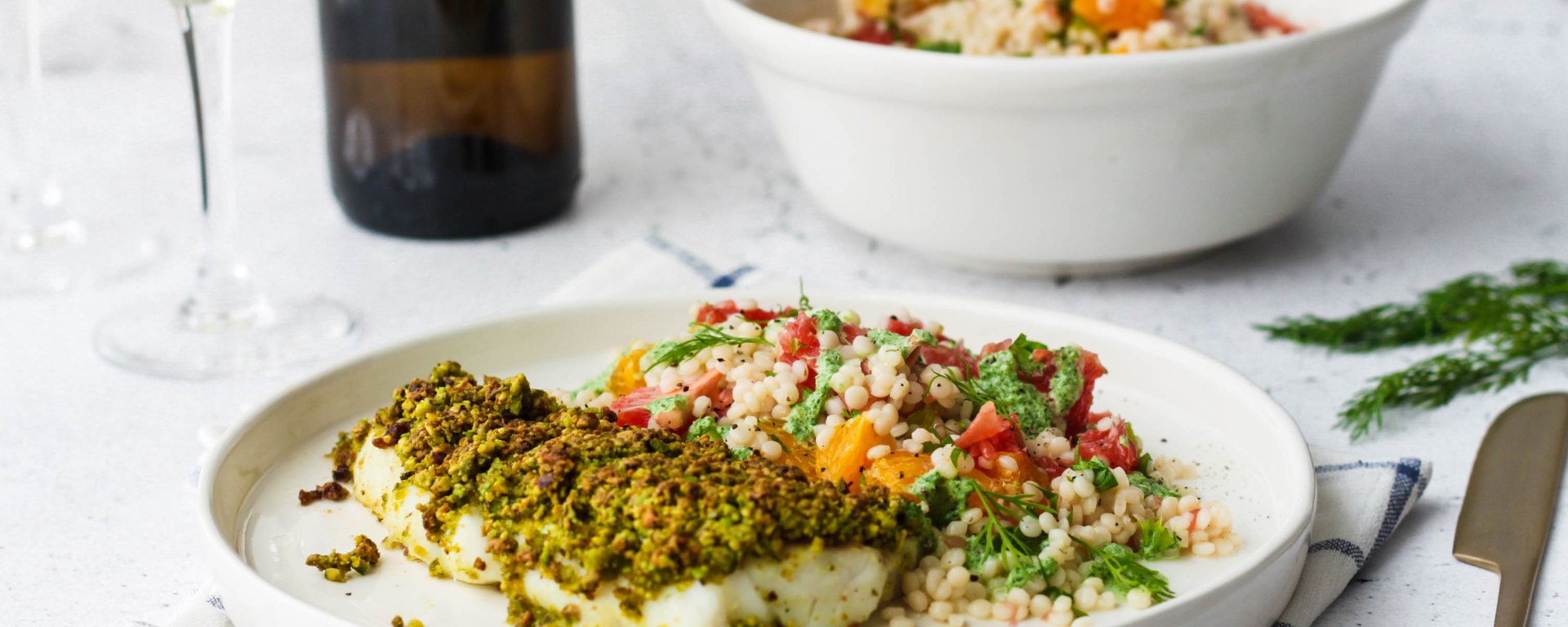 Kabeljauw met pistachekorst, citrussalade en een groene dressing